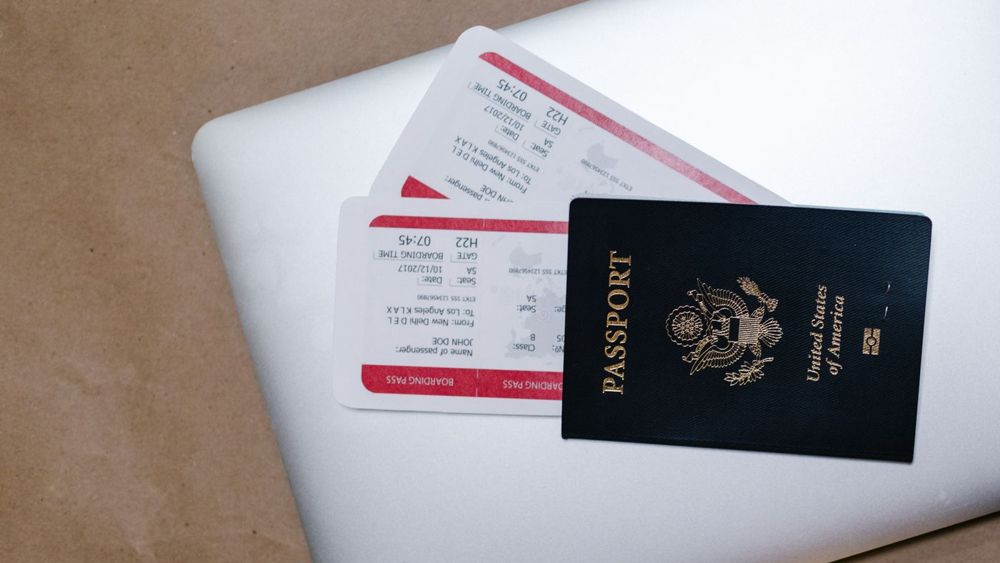 A passport and boarding passes
